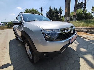 Dacia Duster 2012, 1.6 benzină, AC, tracțiune 4x4 cu moduri selectabile. - imagine 4