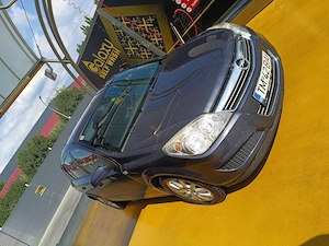 Opel Astra H,1.9 CDTI - imagine 4