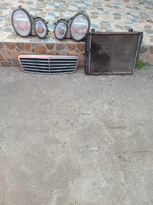 Piese fata Mercedes E-Class W210 Ochelarist - Faruri, Grila, Radiator