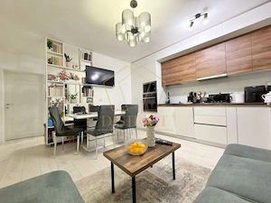 Apartament cu 3 camere, dressing si debara mobilat la etaj intermediar in Giroc.