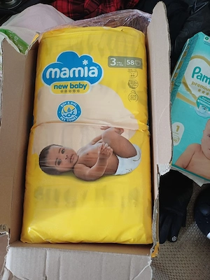 vând pampers bebeluși 