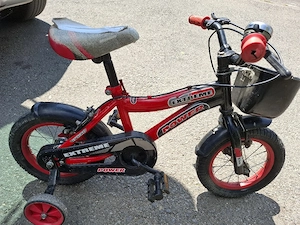 Vand bicicleta copii 12"   100 lei (fix)