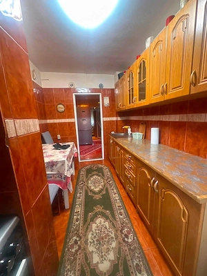 De vanzare apartament cu 4 camere, 2 bai si 2 balcoane, mobilat si utilat, etaj intermediar  - imagine 2