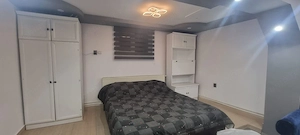 Casă P+M cu 1.558 mp teren, livadă și garaj - imagine 3