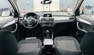 Bmw Seria X - imagine 6