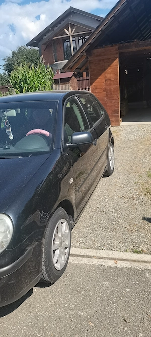 De vînzare. VW polo an fab 2003 motor 1,4 benzină, distribuție lanț culoare neagră. 213455km - imagine 8