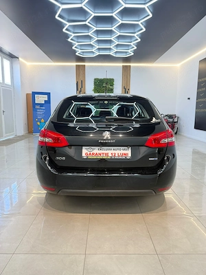** Peugeot 308 ** - imagine 10