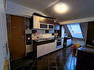 apartament modern tip mansarda de inchiriat