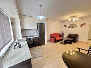 Inchiriere-apartament-2 camere-open space-nou-parcare-mobilat-utilat - imagine 3