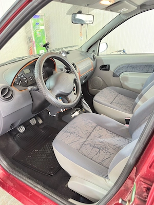 Dacia Logan 1.4mpi 46000km - imagine 4