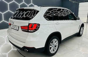 Bmw Seria X - imagine 4