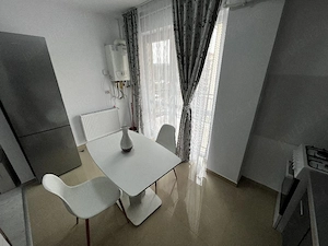 Închiriez apartament nou,modern cu 2 camere complet mobilat și utilat  - imagine 4