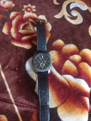 Ceas fossil foarte bun 