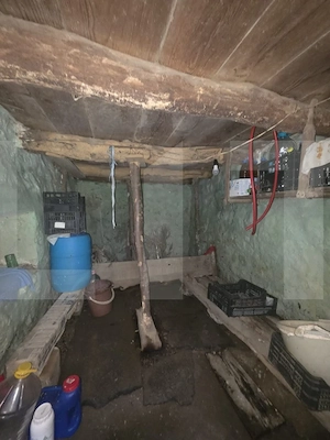 Casa taraneasca de lemn cu veranda - imagine 12