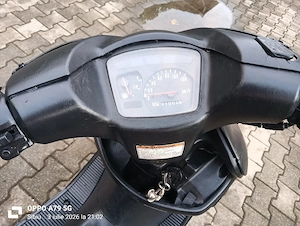 scuter Suzuki Hocuto 
