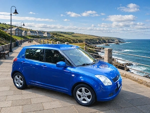Suzuki Swift automat 1.3 benzina navigatie - imagine 3