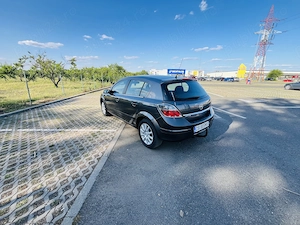 Opel Astra H 2009 - imagine 6