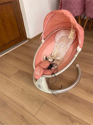 Balansoar electric pentru bebeluși
