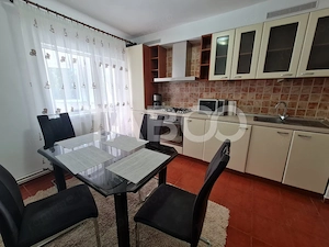 Apartament spatios cu 3 camere si 2 bai plus balcon in zona Central - imagine 2