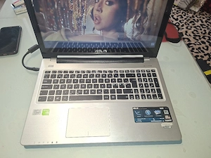 Laptop Asus cu Intel i7, touchscreen 15,6 inch, SSD 240gb, video dedicat, 8 gb ram