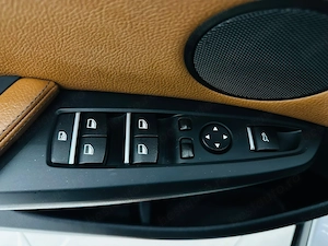 Bmw Seria X - imagine 11