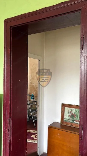 Casă cu teren de 1.025 mp Lumina | 4 camere | Potențial excelent de renovare  - imagine 16