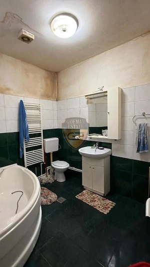 Casă cu teren de 1.025 mp Lumina | 4 camere | Potențial excelent de renovare  - imagine 15