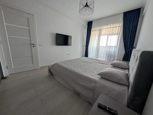 Inchiriez apartament 2 camere complet mobilat si utilat-Prima închiriere-2 locuri de parcare