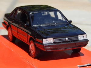 Macheta Volkswagen Santana 1.8 (Passat B2 sedan) 1987 Welly NEX scara 1:34