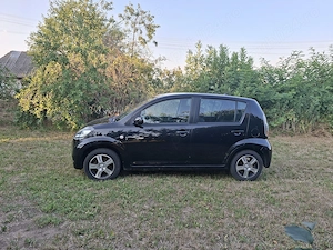 Daihatsu Sirion 1.3 benzina  4 4 Permanent An 2008 - imagine 3