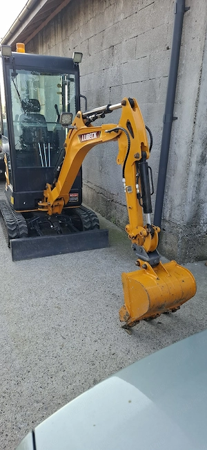 vând mini excavator lubeck ca nou motor în trei cilindri kubota trei cupe accept probe la fața locul - imagine 4
