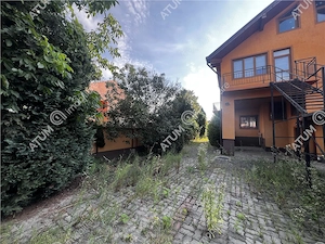 Spatiu comercial cu 10 camere 4 bai si teren de 600 mp zona Piata Cluj - imagine 7