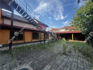 Spatiu comercial cu 10 camere 4 bai si teren de 600 mp zona Piata Cluj