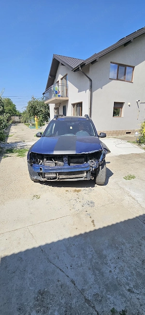 Vând Dacia Duster avariat față - imagine 2
