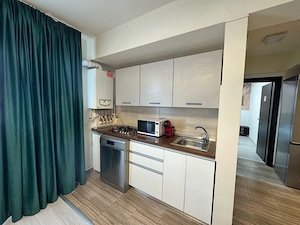Proprietar vand Apartamnet utilat si mobilat   loc de parcare inclus