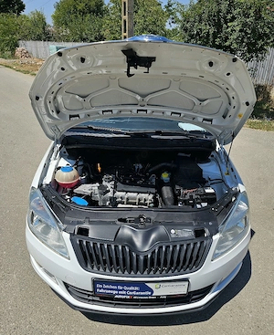 Skoda Fabia 1.2 HTP FRESH Navigatie ClimaManuala DistribuțieSchimbata CamerăMarșarier Bluethoot  - imagine 13
