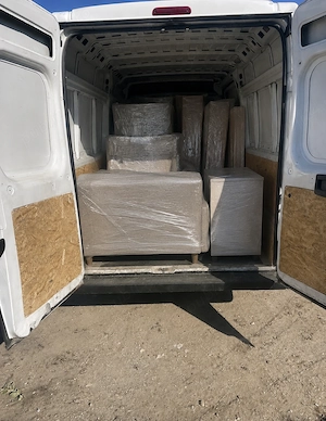 Transport marfa  mobilă mutări