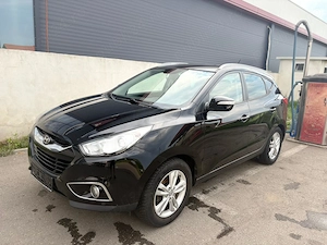 Hyundai ix35 2012 1.6 Gdi cutie manuala  - imagine 3