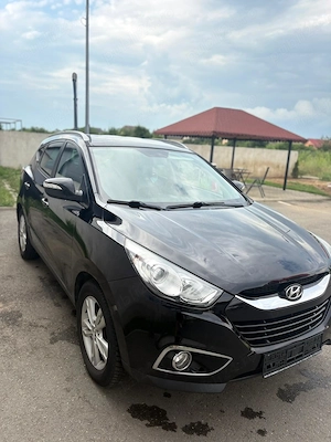 Hyundai ix35 2012 1.6 Gdi cutie manuala  - imagine 9
