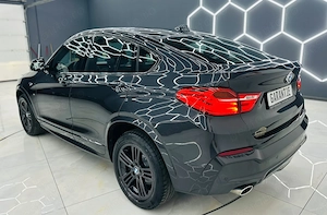 Bmw Seria X - imagine 4