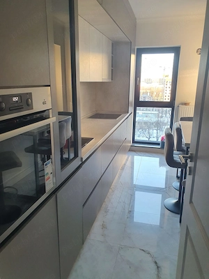Ofer spre inchiriere apartament  - imagine 2