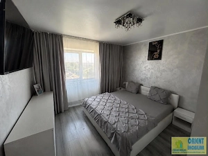 Km 4-5, de vanzare apartament 3 camere, decomandat, gaze - imagine 3
