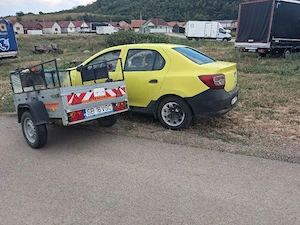 vând sau schimb logan si o remorca 