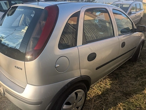 Opel Corsa C, gri, diesel 2005, cumpărat de nou, ingrijit îsi cauta nou proprietar - imagine 4