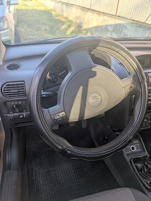 Opel Corsa C, gri, diesel 2005, cumpărat de nou, ingrijit îsi cauta nou proprietar - imagine 8