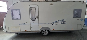 Rulota Adria cu 2 zone de dormit - Caravana cu pat fix