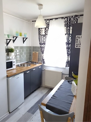 Schimb garsoniera cu apartament