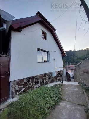 Casa in curte comuna de 2 camere zona Prund-Schei