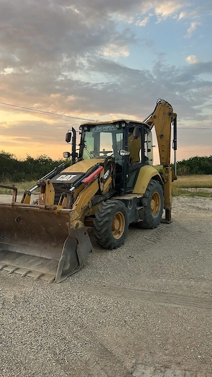 Vand Buldoexcavator CAT