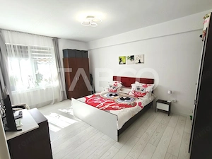 Apartament decomantat 3 camere 2 bai 70 mp utili cu parcare subterana - imagine 4